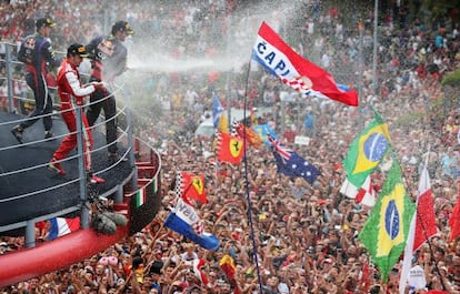 Vettel, Webber y Alonso, con el público de Monza.