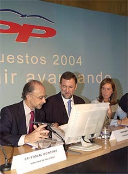 Mariano Rajoy junto a Ana Mato y Cristóbal Montoro en las jornadas del PP.