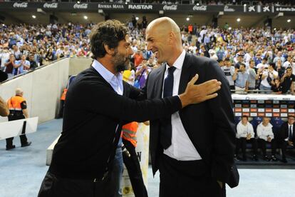 En la foto Quique Sanchez Flores y Zidane.