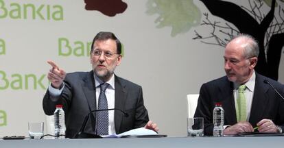 Mariano Rajoy y Rodrigo Rato, en el Encuentro Financiero Intenacional Bankia / EL PAÍS 2012.