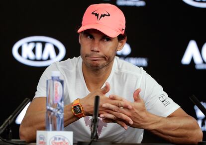 In this Jan. 23, 2018, file photo, Spain's Rafael Nadal answers questions at a press conference after retiring injured from his quarterfinal against Croatia's Marin Cilic at the Australian Open tennis championships in Melbourne, Australia.