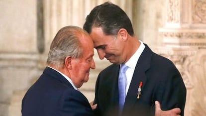 Emeritus king Juan Carlos and his son Felipe in a file photo.