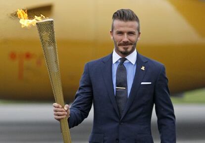 David Beckham, con la antorcha ol&iacute;mpica, el 28 de junio. 