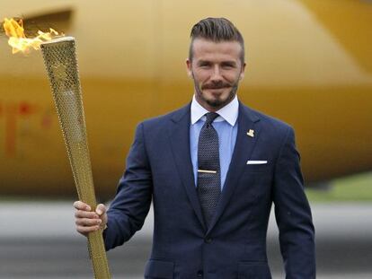 David Beckham, con la antorcha ol&iacute;mpica, el 28 de junio. 