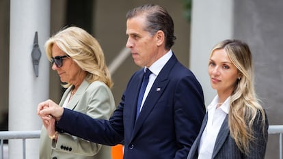 Hunter Biden holds hands with First Lady Jill Biden and wife Melissa Cohen Biden as he departs his federal gun trial after a jury found him guilty on Tuesday.