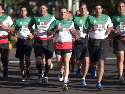 El presidente Enrique Peña Nieto, al centro, en una carrera organizada el pasado 15 de agosto.