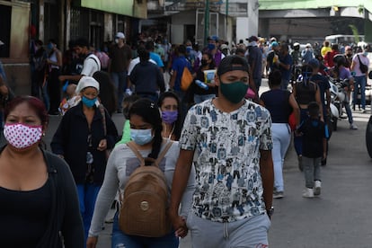 Venezolanos en el barrio de Petare, en el área metropolitana de Caracas.