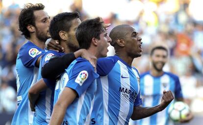 Rol&aacute;n celebra uno de sus dos goles. 