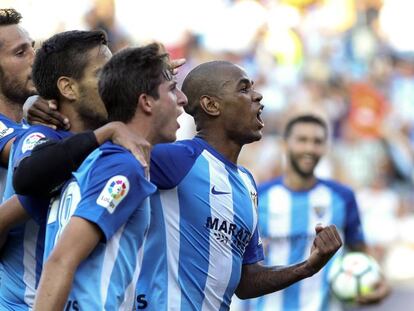 Rol&aacute;n celebra uno de sus dos goles. 