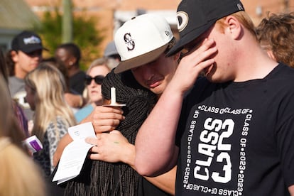 mourners attend a vigil at the First Baptist Church of Dadeville following last night's mass shooting at the Mahogany Masterpiece dance studio in Dadeville, Alabama