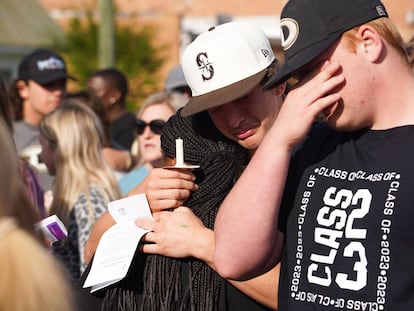 mourners attend a vigil at the First Baptist Church of Dadeville following last night's mass shooting at the Mahogany Masterpiece dance studio in Dadeville, Alabama