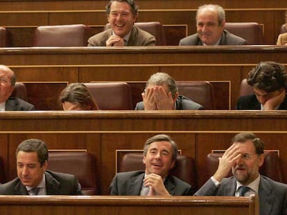 Bancada del PP. En primer término, Eduardo Zaplana, Ángel Acebes y Mariano Rajoy, de izquierda a derecha.