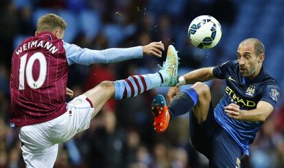 Weimann y Zabaleta, en un lance del Villa-City.