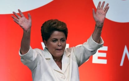 Brazilian President Dilma Rousseff waves after her win on Sunday.