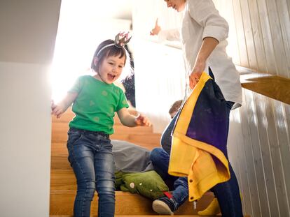 Children getting dressed for school, morning stress concept.