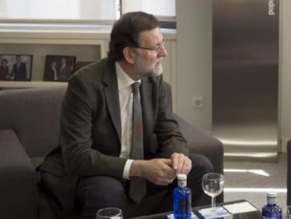 Rajoy y Mitzy Capriles, este viernes en la sede del PP.