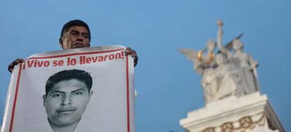 A protestor in Mexico City demands justice for the 43 missing students during a recent demonstration.