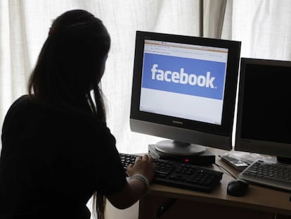 FILE - In this Monday, June 4, 2012, file photo, a girl looks at Facebook on her computer in Palo Alto, Calif. Most teenagers have taken a break from social media, according a new poll from The Associated Press-NORC Center for Public Affairs Research. The breaks are both voluntary and involuntary, such as when a parent takes their phone away as punishment. (AP Photo/Paul Sakuma, File)