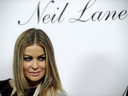 Para Carmen Electra, posar desnuda es toda una libertad. La ex vigilante de la playa, que está a punto de casarse con el guitarrista de KoRn, Rob Patterson, no tiene ninguna intención de dejar de desnudarse en frente de las cámaras porque le encanta. "Empecé mi carrera con <i>Playboy</i> en 1996 y me di cuenta de que para mí el quitarme la ropa y posar desnuda es una libertad impagable". La modelo de 36 años ha vuelto a posar para la <i>Playboy</i> este año como celebración del 55 aniversario de la legendaria revista fundada por Hugh Hefner.