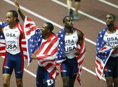 Wallace Spearmon, Darvis Patton, Leroy Dixon y Tyson Gay celebran su triunfo