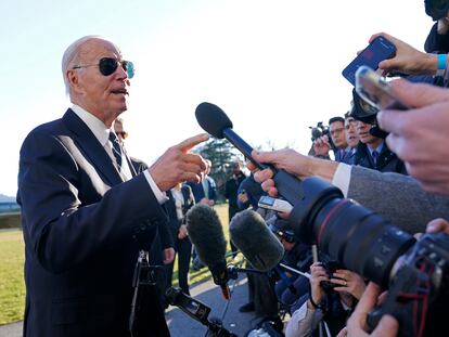 President Joe Biden talks with reporters on the South Lawn of the White House in Washington, Monday, Jan. 30, 2023.