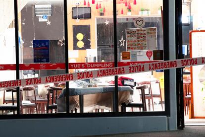 Police tape cordons off a restaurant in Auckland, New Zealand, Tuesday, June 20, 2023