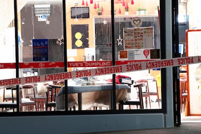 Police tape cordons off a restaurant in Auckland, New Zealand, Tuesday, June 20, 2023