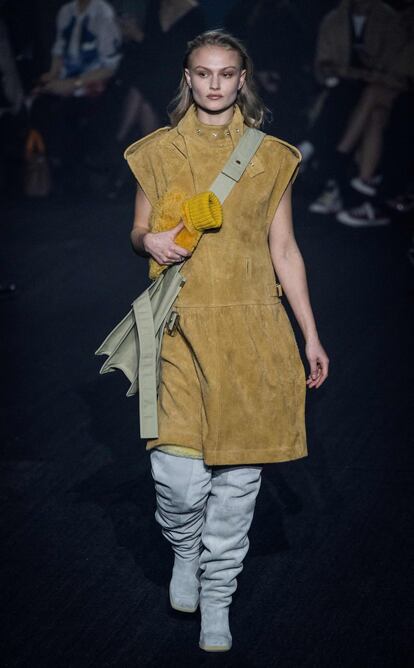 A model wears some of Daniel Lee's pieces at the designer’s first fashion show for Burberry on February 20, 2023, in London.