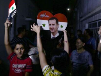 Comemoração em Damasco após a vitória de Assad.