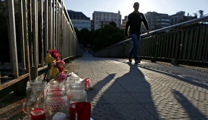 Flowers and candles mark the spot where Isabel Carrasco was shot dead on Monday.