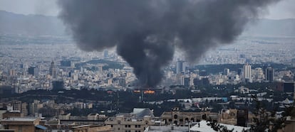 Smoke rises after a reported Israeli strike on a building used by Islamic Republic of Iran News Network, part of Iran's state TV broadcaster, on June 16, 2025 in Tehran, Iran.