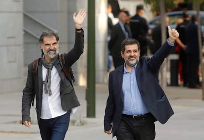 Jordi S&agrave;nchez y Jordi Cuixart, a su llegada el lunes a la Audiencia Nacional.