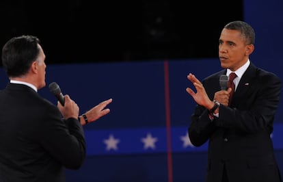 Obama y Romney se enfrentan en el debate.