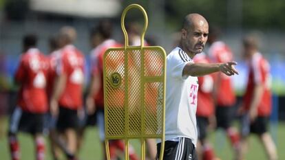 Ex-Bar&ccedil;a coach Guardiola directs a training session with his new club Bayern Munich.