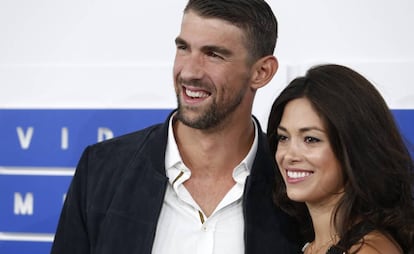 Michael Phelps y Nicole Johnson, en un 'photocall' el pasado mes de agosto.