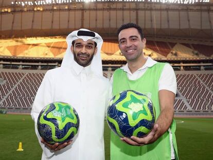 Xavi con Hassan alThawadi, secretario general del Mundial 2022