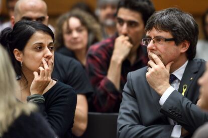 Anna Gabriel junto a Carles Puigdemont durante un acto en Consejo de Derechos Humanos de las Naciones Unidas, el 19 de marzo de 2018 en Ginebra (Suiza).