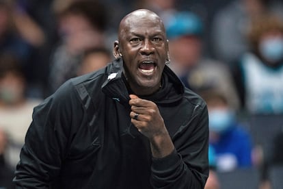 Michael Jordan looks on during the first half of an NBA basketball game between the Charlotte Hornets and the New York Knicks in Charlotte, North Carolina, in 2021.