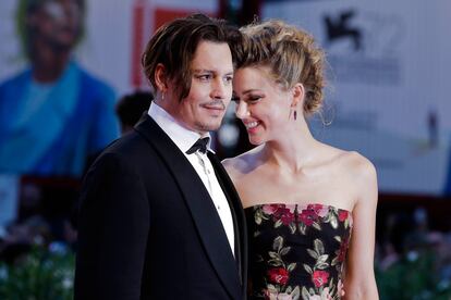 Johnny Deep y Amber Heard. juntos la alfombra roja de la Mostra. La actriz protagoniza The Danish Girl.