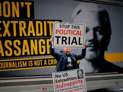 A pro-Assange demonstrator protests outside the Old Bailey court in central London on September 8.