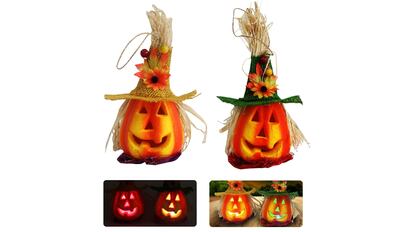 Faroles con diseño de calabaza para decorar el exterior del hogar con velas en Halloween