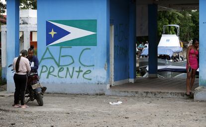 Un grafiti de las Autodefensas Gaitanistas de Colombia en Unguía, en el departamento de Chocó, en abril de 2023.