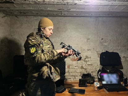 Annya, a Ukrainian soldier, with one of the drones.