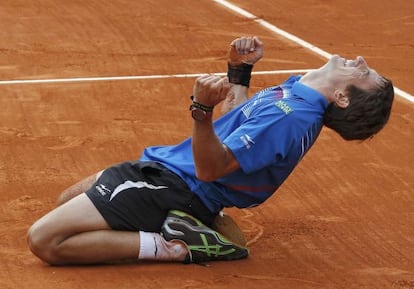 Tommy Robredo of Spain celebrates defeating Gaël Monfils of France.