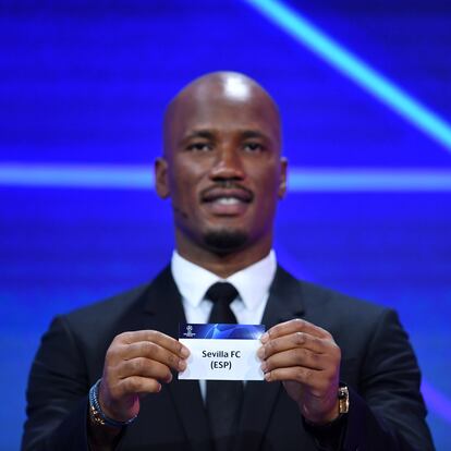 Soccer Football - Champions League - Group Stage Draw - Geneva, Switzerland - October 1, 2020 Didier Drogba draws out Sevilla FC UEFA Pool/Handout via REUTERS??ATTENTION EDITORS - THIS IMAGE HAS BEEN SUPPLIED BY A THIRD PARTY. NO RESALES. NO ARCHIVES