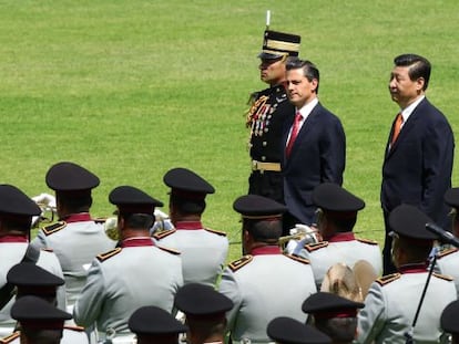 Os presidentes Enrique Peña Nieto e Xi Jinping, em junho, no México.