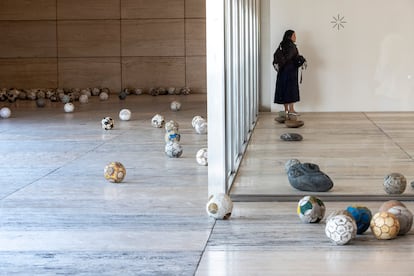 Part of the exhibit titled 'Accelerated Soccer Balls' (2004).