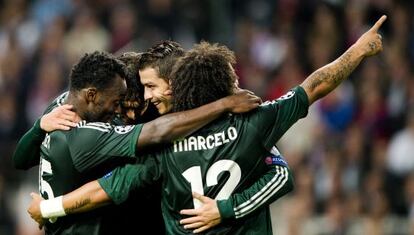 Cristiano Ronaldo (second right) celebrates scoring against Ajax in Real&rsquo;s 1-4 win in Amsterdam. 