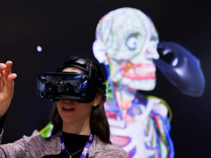 A person wears Varjo's human-eye resolution VR headset to learn human anatomy at the Varjo's Metaverse stand during the Mobile World Congress (MWC) in Barcelona, Spain February 27, 2023