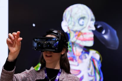 A person wears Varjo's human-eye resolution VR headset to learn human anatomy at the Varjo's Metaverse stand during the Mobile World Congress (MWC) in Barcelona, Spain February 27, 2023